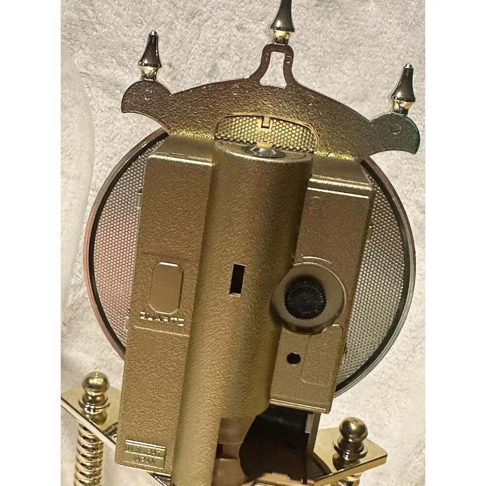 Elgin Magic Eye Anniversary Glass Dome Quartz Rotating Pendulum Clock Vintage